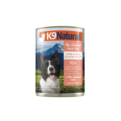 A can of K9 Natural Lamb & King Salmon Grain-Free Canned Dog Food showcases a happy dog, mountain scenery, and emphasizes quality New Zealand ingredients rich in Omega-3 Fatty Acids for your pet’s balanced nutrition.