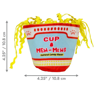 The KONG Crackles Cup of Mew-Mews Cat Toy by Kong resembles instant noodles with yellow fabric noodles on top. It measures 4.25 inches (10.8 cm) tall and wide and features a natural catnip flavor cats love.