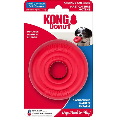 A KONG Donut Dog Toy – Durable Rubber Chew & Fetch Fun by Kong is shown in its packaging for small to medium dogs, featuring a photo of a dog with the toy and information about its durability and use for average chewers.