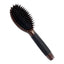 The Kenchii Boar Nylon Bristle Brush by Kenchii features black anti-static ionic nylon bristles and a textured, ribbed handle grip, shown against a white background.
