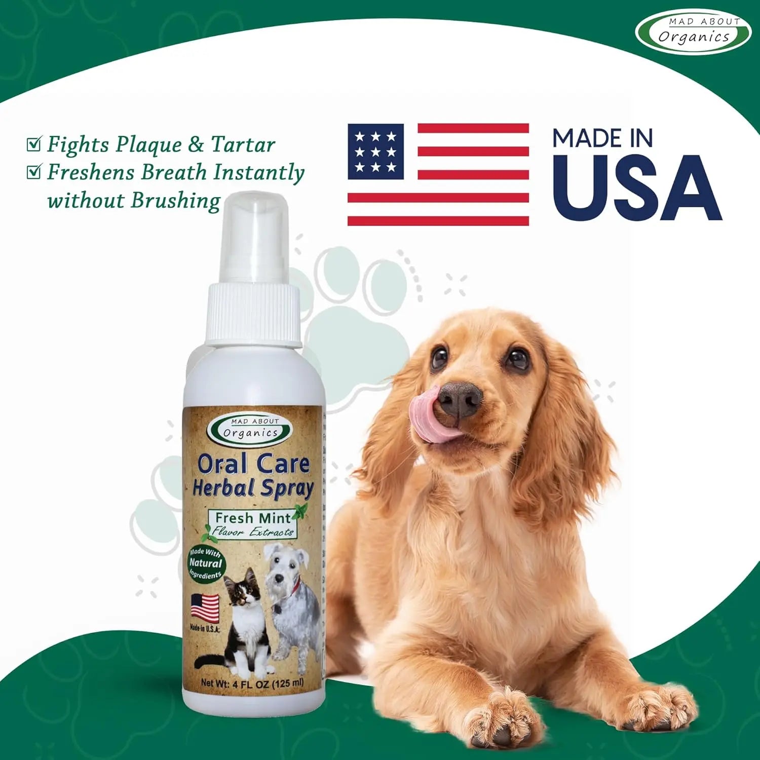 A happy dog licks its lips beside Mad About Organics Oral Care Spray - Fresh Mint Formula, with a Made in USA flag, highlighting pet oral care benefits for plaque and fresh breath.