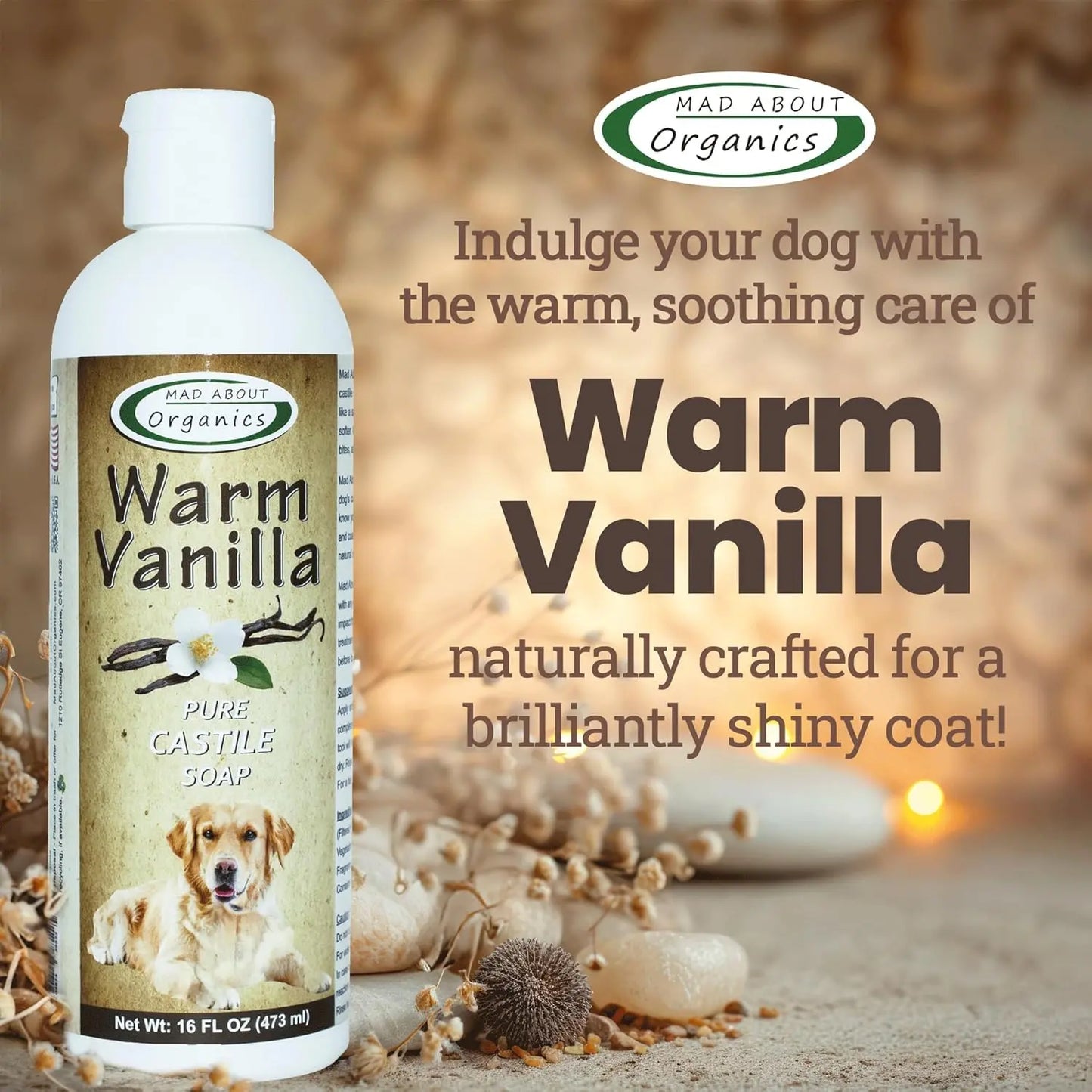 Mad About Organics Warm Vanilla Dog Shampoo 16oz sits on a table, featuring a golden retriever and vanilla flower on the label. Spa items set a calming mood. Text emphasizes soothing warm vanilla scent and gentle relief for sensitive skin.
