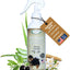 An 8oz spray bottle of Mad About Organics Detangler Spray—Knot-Free Coats Made Easy—features a warm vanilla cedarwood scent, ingredients like aloe, olive, and oats, and a brown tag highlighting features plus a Made in USA label.