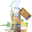 An 8oz Mad About Organics Detangler Spray bottle, with aloe leaves, lemon slice, and white flowers nearby. A tag notes all-natural pet conditioner benefits, while a US flag emphasizes American-made quality.