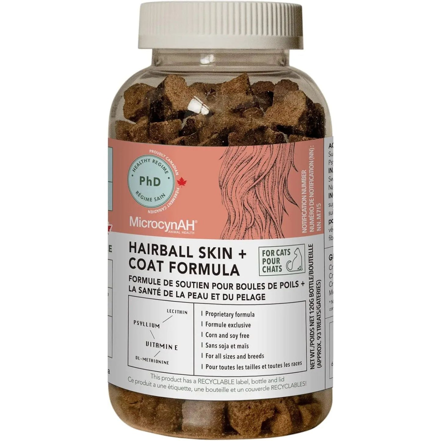 A clear bottle labeled MicrocynAH MICRO Cat Skin & Coat Hairball Soft Chews 120g holds brown chews. The label showcases cat skin health, shiny coat, and hairball support with leaf and cat illustrations. Brand: MicrocynAH.