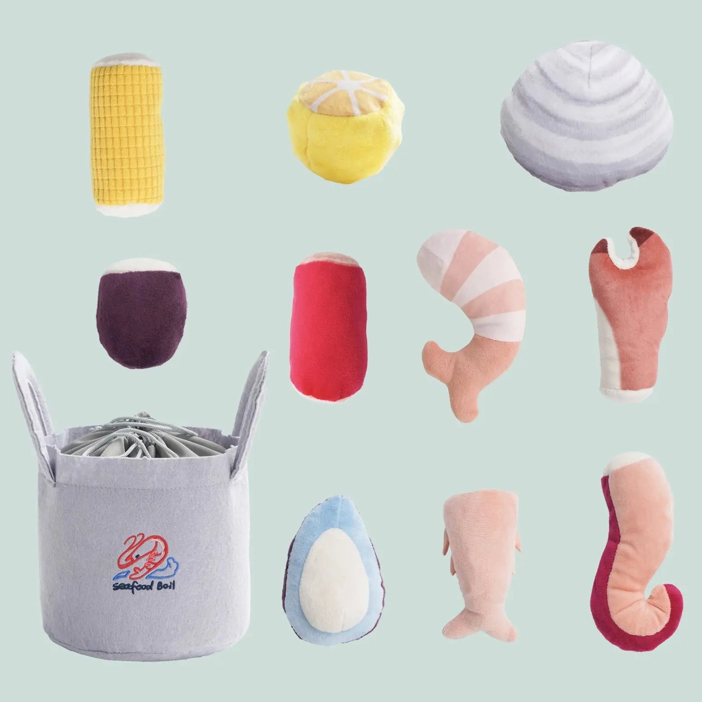 The Nocciola 10-Piece Seafood Boil Dog Toy Set features plush seafood-shaped toys with squeakers and crinkle sounds, plus a cute storage basket labeled Seafood Boil. Perfect for interactive play and adorable on display.