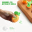 A hand holds the Nocciola Hide & Chew Carrot Enrichment Toy with green leaves, removed from its brown base. Text reads “Sounds to attract dogs.” An illustration reveals a round squeaker for interactive dog mental stimulation. Brand: Nocciola.