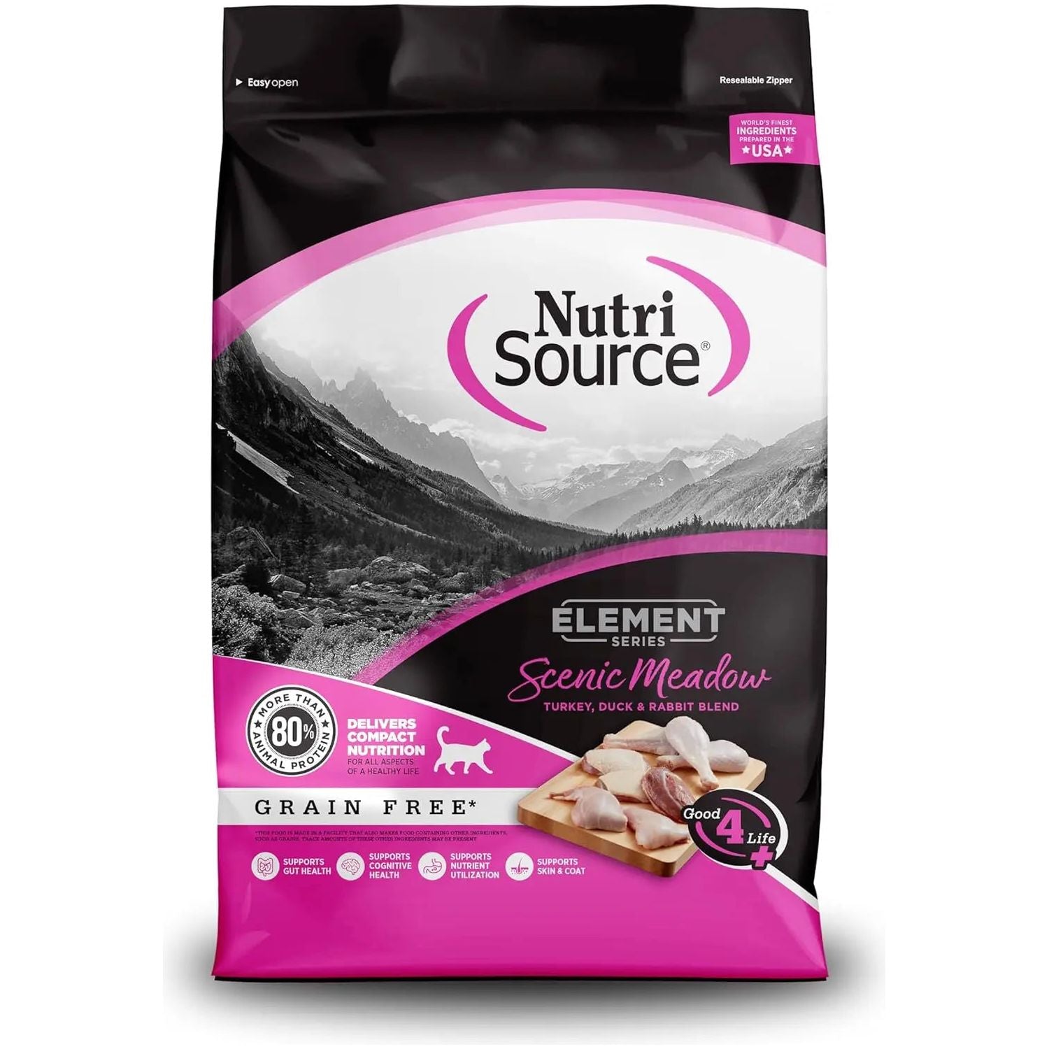 A bag of NutriSource Element Series Scenic Meadow Grain Free Dry Cat Food features black and pink packaging, mountain scenery, and raw meat images, highlighting its high-protein, gut health-focused formula.