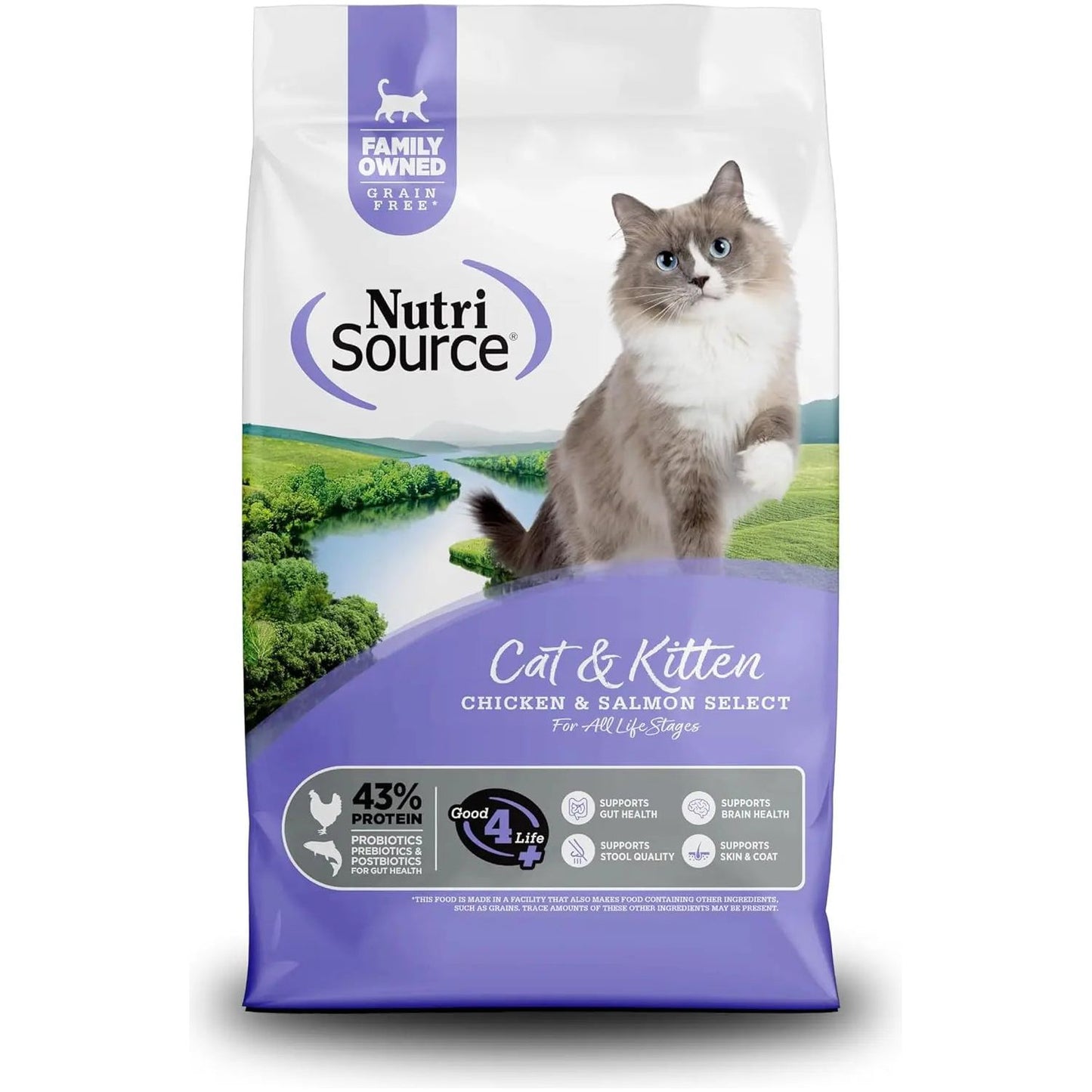 A bag of NutriSource Grain Free Chicken & Salmon Select Cat & Kitten Dry Cat Food, showing a gray and white blue-eyed cat by a river and grass, highlights digestive health benefits and high protein content.