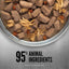 A bowl of ORIJEN Real Meat Shreds Chicken & Eggs Recipe Stew shows chunks of meat and shredded chicken in broth, with carrot pieces. Below, text highlights 95% animal ingredients and water plus classic grain-free wet dog food from ORIJEN.