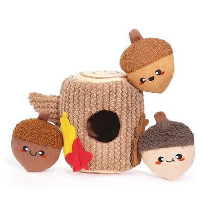 The Hugsmart Pet Oriland Autumn Woofs Acorn Tree Interactive Dog Toys includes three plush, smiling acorns, a textured log with a hole, and colorful leaves for playful fall fun and mental stimulation for your dog.