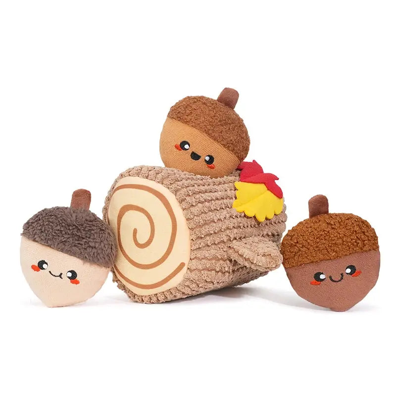 The Hugsmart Pet Oriland Pet Autumn Woofs Acorn Tree features three plush acorns and a textured plush log with a red and yellow leaf, creating an interactive dog toy for playful fun and mental stimulation.