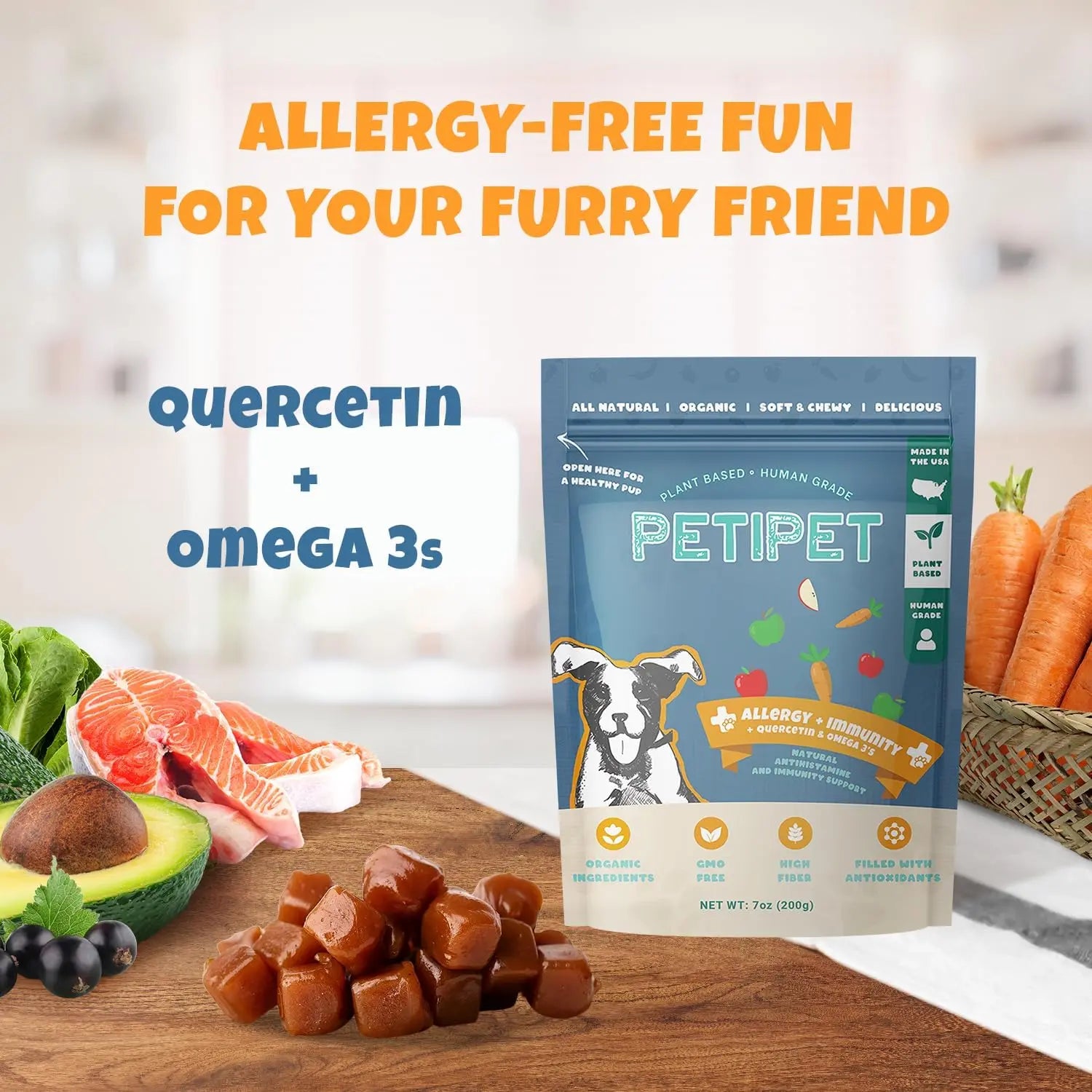 A bag of PETIPET Allergy + Immunity with Quercetin & Omega 3 Apple & Carrot Flavored Soft Chew Dog Supplement sits on a kitchen counter with treats, fruits, and veggies. Text highlights allergy-free fun and natural immunity support.
