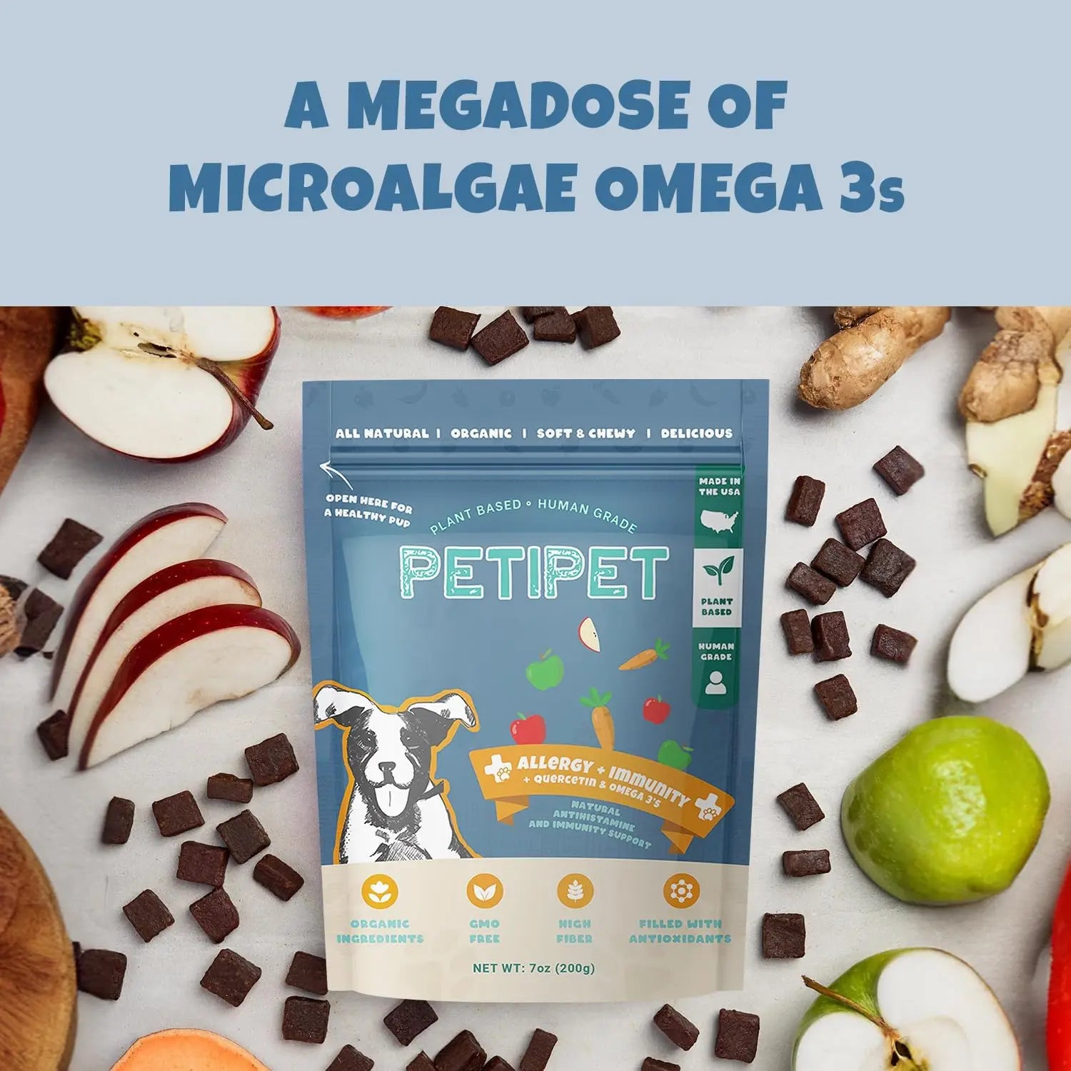 A bag of PETIPET Allergy + Immunity with Quercetin & Omega 3 Apple & Carrot Flavored Soft Chew Allergy Supplement for Dogs is surrounded by apple slices, sweet potato, ginger, and treats. Text reads “A megadose of omega 3s for allergy relief for dogs” on a blue background.