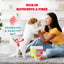 A woman smiles and plays with a small dog indoors. Text reads, “Rich in nutrients & fiber—promotes a healthy gut.” A bag of PETIPET Bananas + Strawberries Bites Soft & Chewy Dog Treats 5 oz is visible in the foreground.