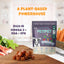 A bag of PETIPET Omega DHA Bites with Marine Algae DHA + EPA Apple & Carrot Flavored Soft Chews for Dogs sits on a kitchen counter amid veggies, salmon, and grapes. Text reads “A Plant-Based Powerhouse” and “Rich in Omega 3 + marine algae DHA.”.