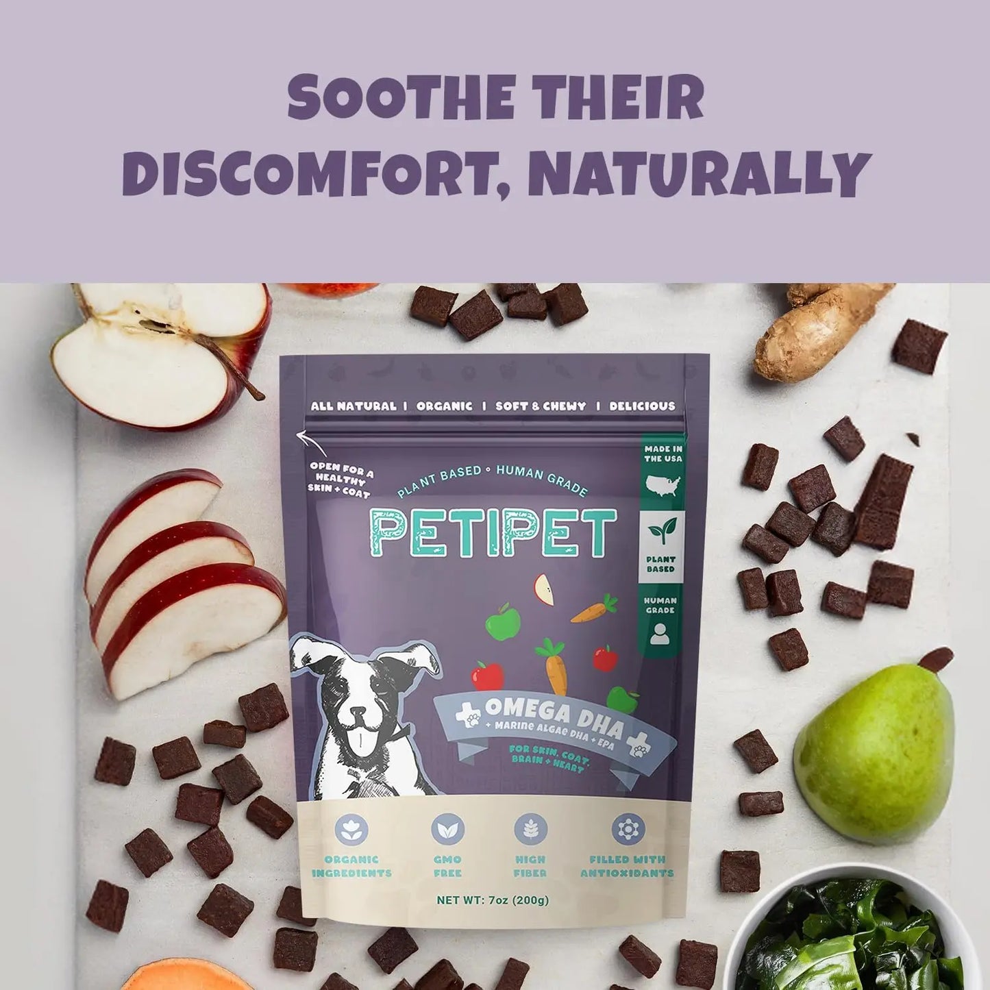 A bag of PETIPET Omega DHA Bites with Marine Algae sits among apples, pears, sweet potatoes, greens, and treats. Text above: Soothe your dog’s discomfort naturally with this plant-based brain & heart health supplement.