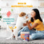 A smiling woman kneels on the floor playing with a small dog. Text reads “Rich in Nutrients & Fiber” and “Promotes a Healthy Gut.” A bag of PETIPET Pumpkin Fruit + Veggie Bites Gluten-Free Adult Soft & Chewy Dog Treats 5oz is in the foreground.