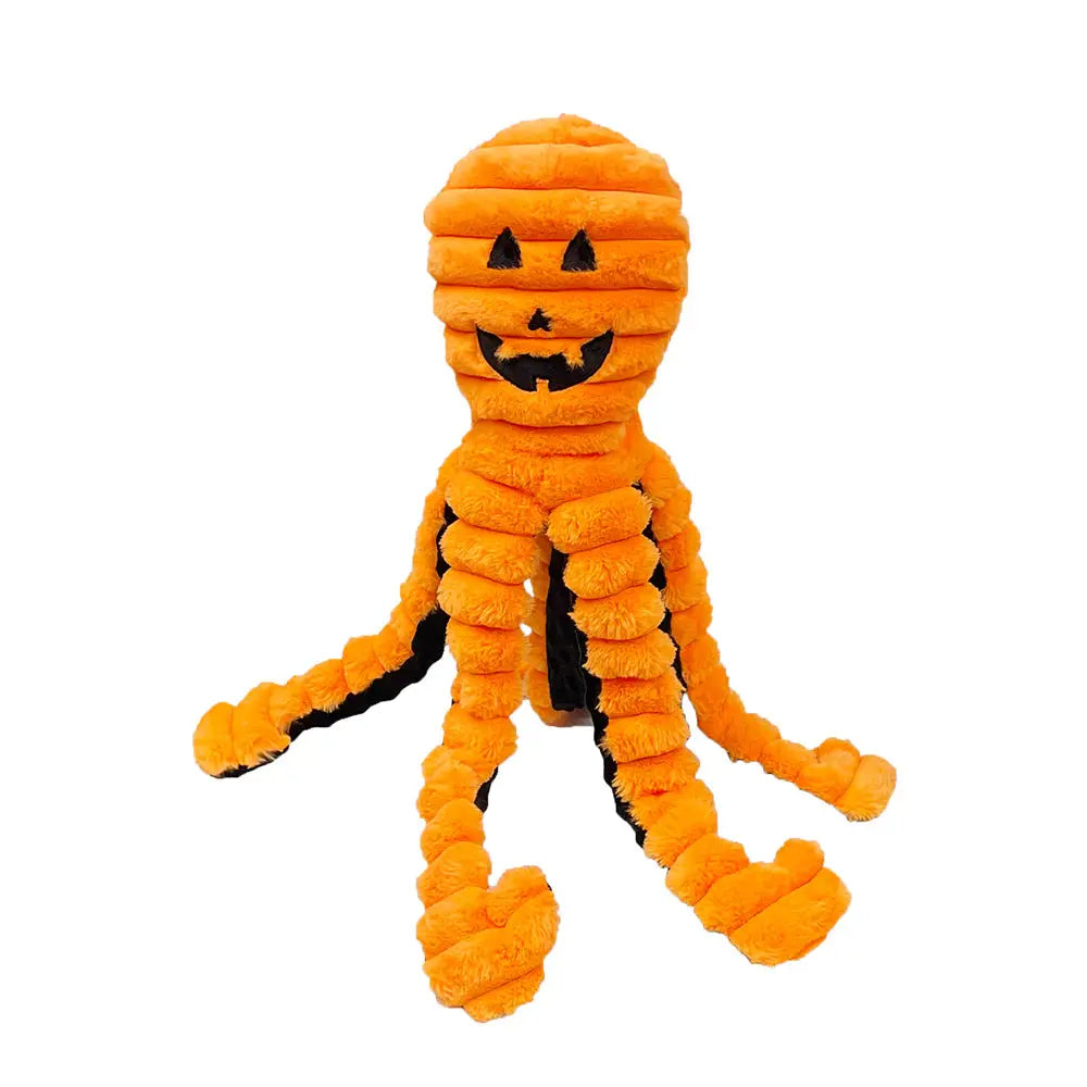 The Petlou Halloween King Octopus Squeaky Plush Dog Toy 26 features bright orange, ribbed tentacles and a jack-o-lantern face with triangular eyes and a smiling mouth. Brand: Petlou. Background is white.