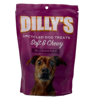 Purple bag of Poochie Butter Dillys Blueberry Soft & Chewy Dog Treats, showing a brown dog looking up, with bold white and yellow text on the packaging.