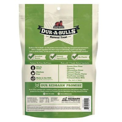 Back of a Redbarn Hickory BBQ Dur-A-Bulls Braid Healthy Dog Chew package, highlighting digestible dog chew details, benefits like no plastic and natural ingredients, whole grain and chicken free icons, plus the Redbarn brand’s promise.