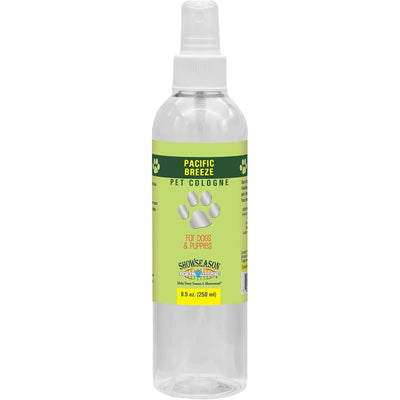 Showseason Pacific Breeze Pet Cologne for dogs and puppies comes in an 8.5 oz (250 ml) clear spray bottle with a green and yellow paw print label, offering long-lasting odor control.