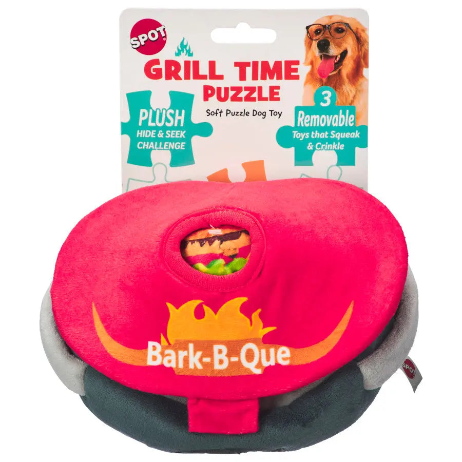 The Spot Grill Time Puzzle Dog Toy by Spot is a red and gray plush toy shaped like a barbecue grill with Bark-B-Que and flame graphics, ideal for interactive playtime. The packaging features the “Grill Time Puzzle” name and a dog in sunglasses.