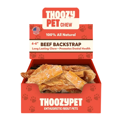 An open box of ThoozyPet USA-Sourced Beef Backstrap Dog Chews 4-6 50ct shows natural, dried chews inside. The red ThoozyPet packaging with paw prints highlights dental health benefits for dogs.