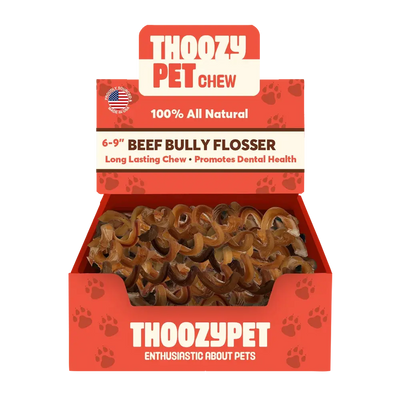 A red and brown ThoozyPet box labeled USA-Sourced Beef Bully Flosser Dog Chews 6-9\ 15ct contains spiral-shaped, 100% all natural beef chews that promote dental health.