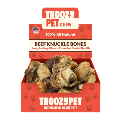 Open ThoozyPet USA-Sourced Beef Knuckle Bone Dog Chews 10ct—100% all natural, long-lasting, and promotes dental health. This red box with paw prints and an American flag icon highlights the USA-sourced quality from ThoozyPet.