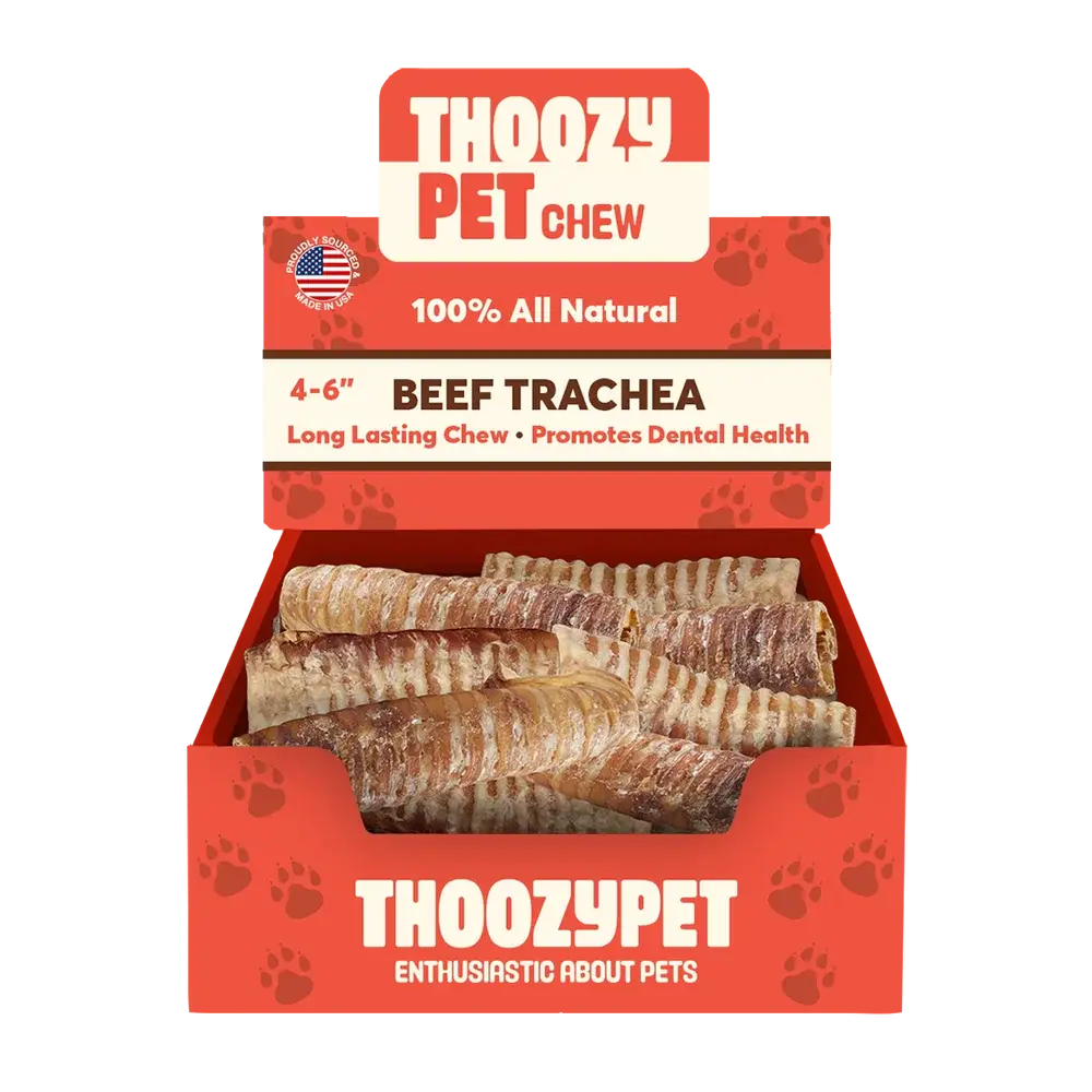 An open red ThoozyPet box contains 4-6 inch USA-sourced Beef Trachea Dog Chews. The packaging states these treats are 100% all natural and support dental health for pets.