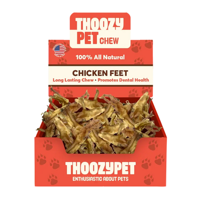 ThoozyPet USA-Sourced Chicken Feet Dog Chews 20ct are 100% all-natural, long-lasting dental health treats. The box features dried chicken feet and paw print designs, proudly from ThoozyPet.