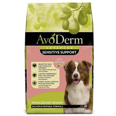AvoDerm Adv Sensitive Support Salmon & Oatmeal Formula Dry Dog Food features avocado illustrations, a brown and white dog, and highlights skin and stomach support with a limited ingredient diet.