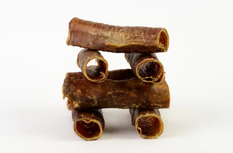 Talis Us trachea and gullet dog treats stacked for dental health and training rewards