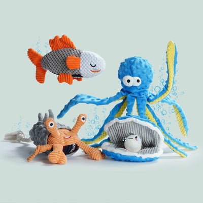 The Nocciola Ocean-Themed Crinkle & Squeaky Dog Toy Set by Nocciola features four plush toys—a fish, octopus, smiling hermit crab, and clam with a pearl—on a light blue backdrop with cartoon bubbles. Perfect for playful dogs!.
