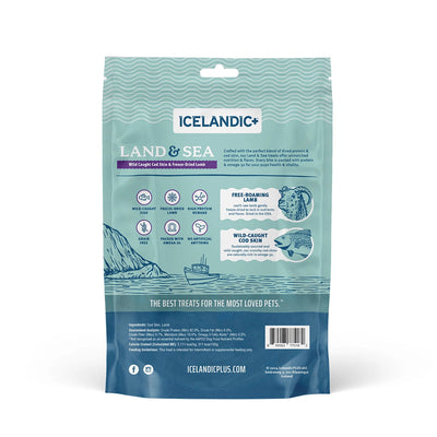 The back of an Icelandic+ Land & Sea Cod Skin & Freeze-Dried Lamb Dog Treat 2.4 oz bag features coastline and fishing boat illustrations, cod skin and lamb images, product info, and Omega-3 benefits on a teal background.