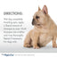 A light brown French bulldog sits looking to the side beside shampoo directions for dogs. The background is white, and the Four Paws Magic Coat Hypoallergenic Dog Shampoo logo appears at the bottom.