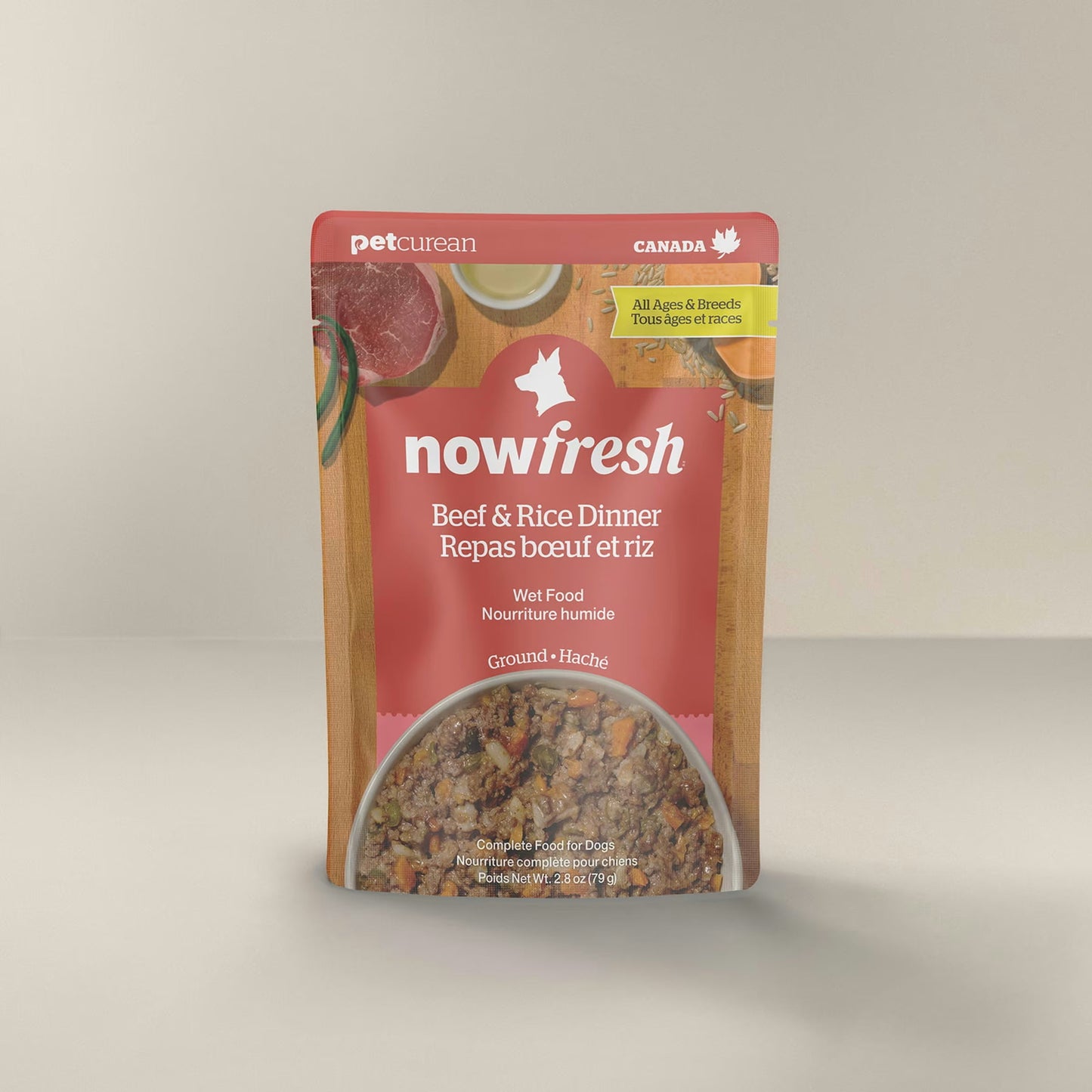 Now Fresh beef and rice wet dog food in a recloseable pouch with fresh ingredients on display