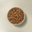 Now Fresh beef and rice wet dog food in a bowl, featuring chunks of meat and vegetables for dogs