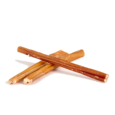 Talis Us premium bully sticks for dogs arranged on a white background for a tasty dog treat option