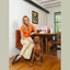 Winnie Lou air dried dog food surf and turf with a happy dog sitting beside its owner in a cozy home setting