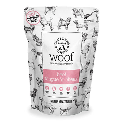 The New Zealand Natural Pet Food Co beef tongue dog treat in a colorful bag featuring playful dog illustrations