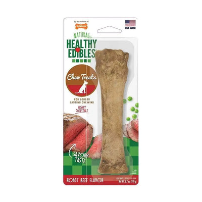 Nylabone® Long Lasting Dog Treats for Heavy Chewers in roast beef flavor are shown on a white and green package with images of beef slices and peas, highlighting savory taste and durable treats ideal for strong chewers.